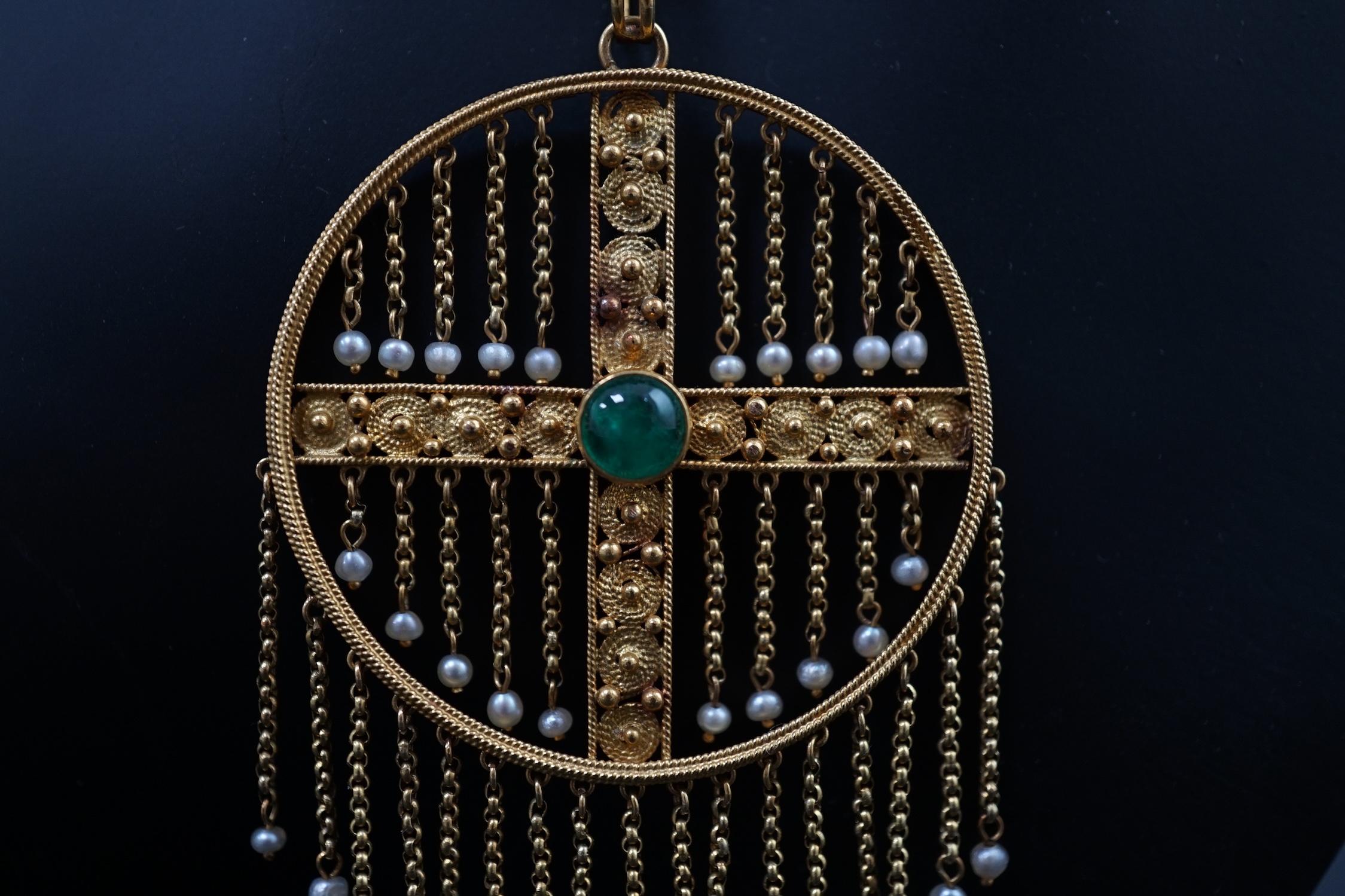 An Edwardian gold, single stone cabochon emerald and seed pearl cluster set tassel drop pendant on chain
